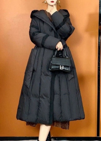 Bohemian Schwarze Pufferjacke Mit Übergroßen Taschen Für Entendaunen Im Winter