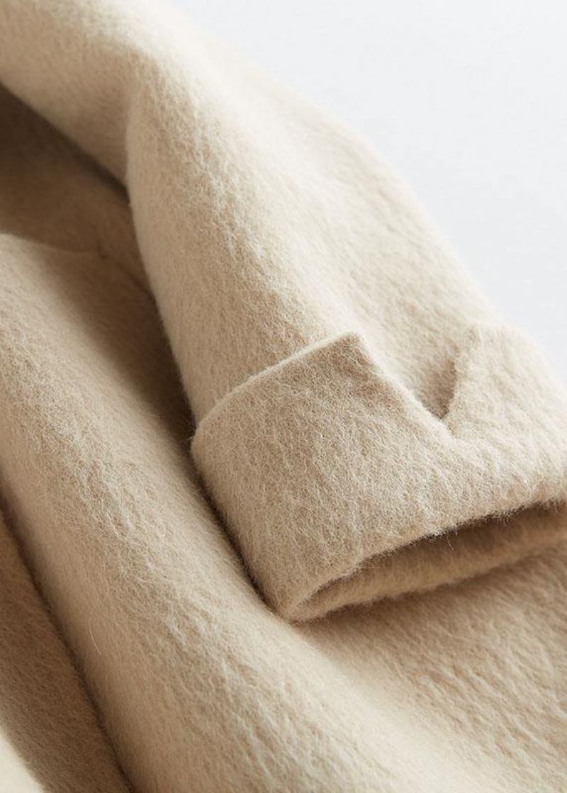 Luxuriöse Beige Wolloberbekleidung Locker Sitzende Mittellange Mäntel Gekerbte Jacke Mit Langen Ärmeln - Damen-Wollmäntel